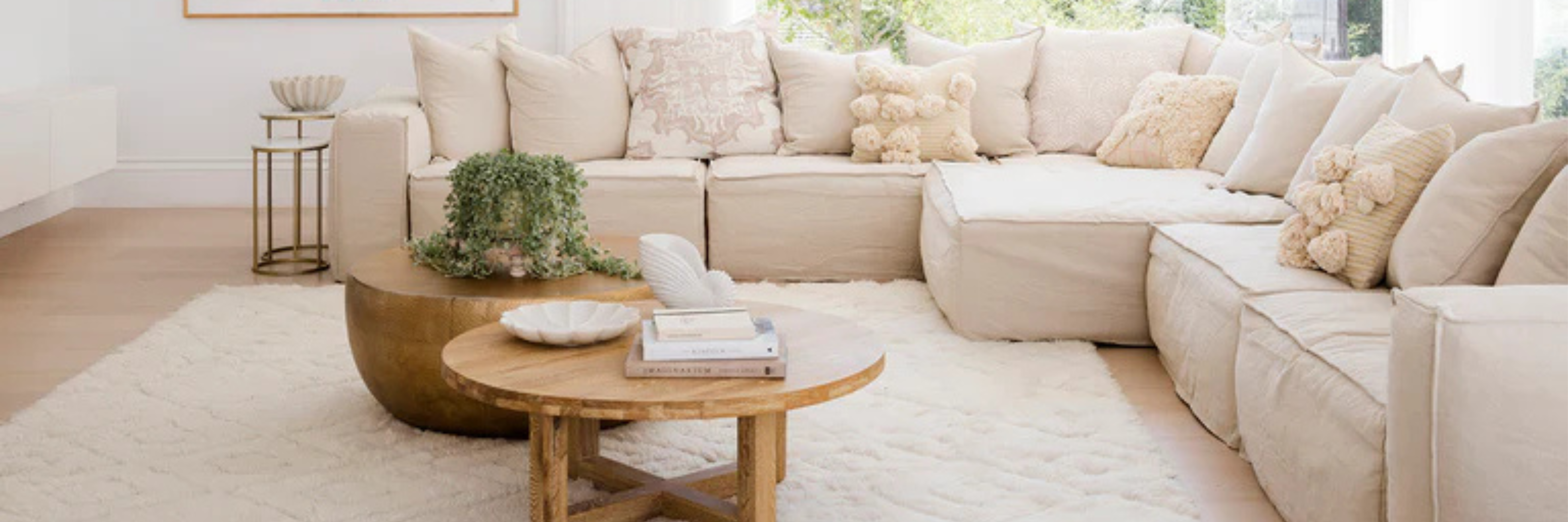 Uniqwa Hendrix Modular Sofa with corner section, with feather cushioning and removable slipcover, timber frame modern coastal sofa with scatter cushions, available in multiple colours.