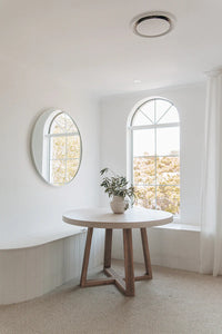 Round concrete dining table in ivory, Magnolia Lane coastal dining