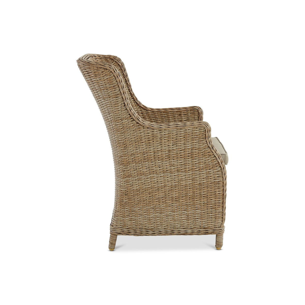 Ashford outdoor dining chair in natural synthetic weave, side view showing the high back, curved arms and light seat cushion