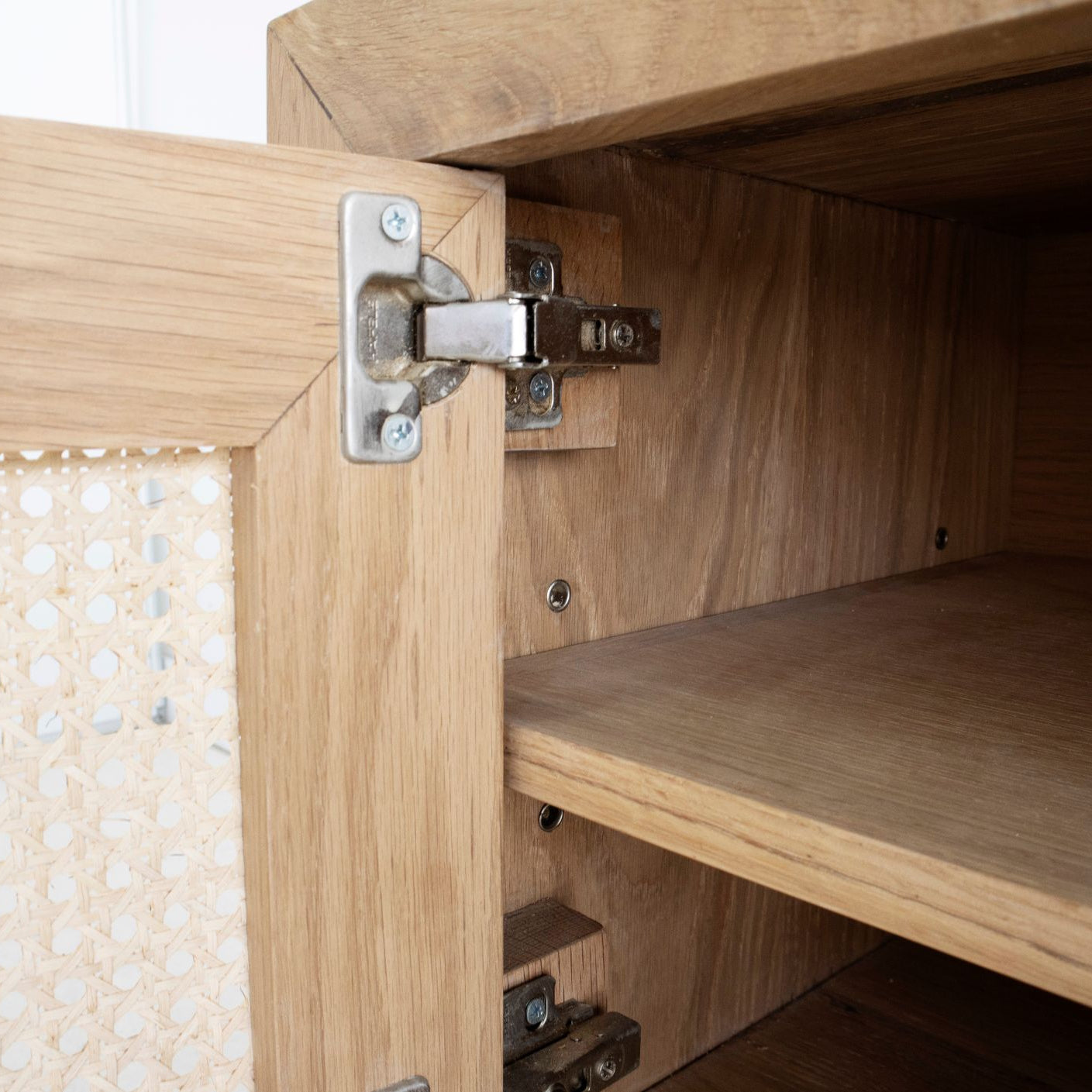 Entertainment unit with adjustable shelving, door storage open view
