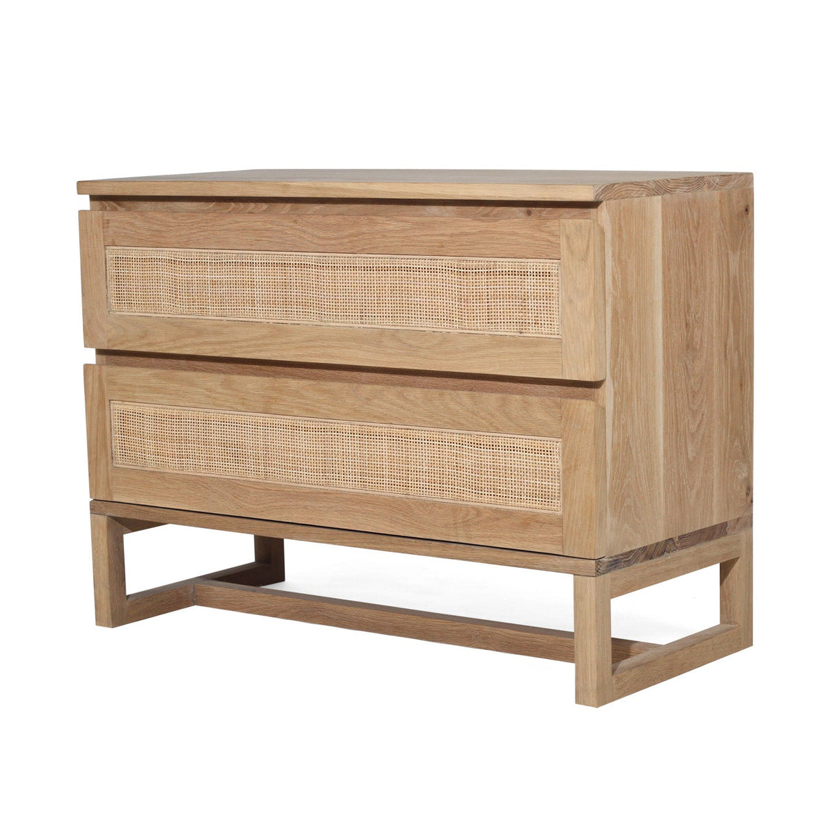 Angled view of the Beach House Wide oak and rattan bedside table 1