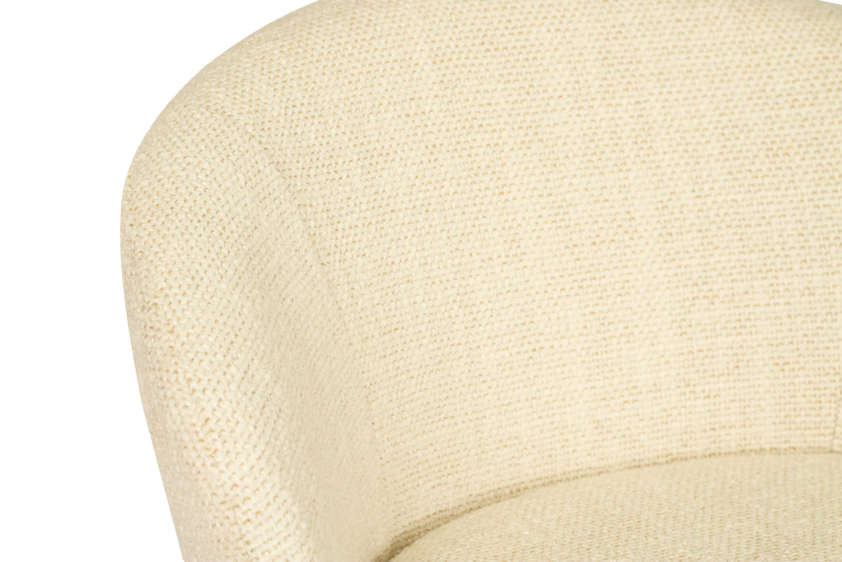 Close-up of the Bellevue counter stool’s natural polyester upholstery and curved backrest