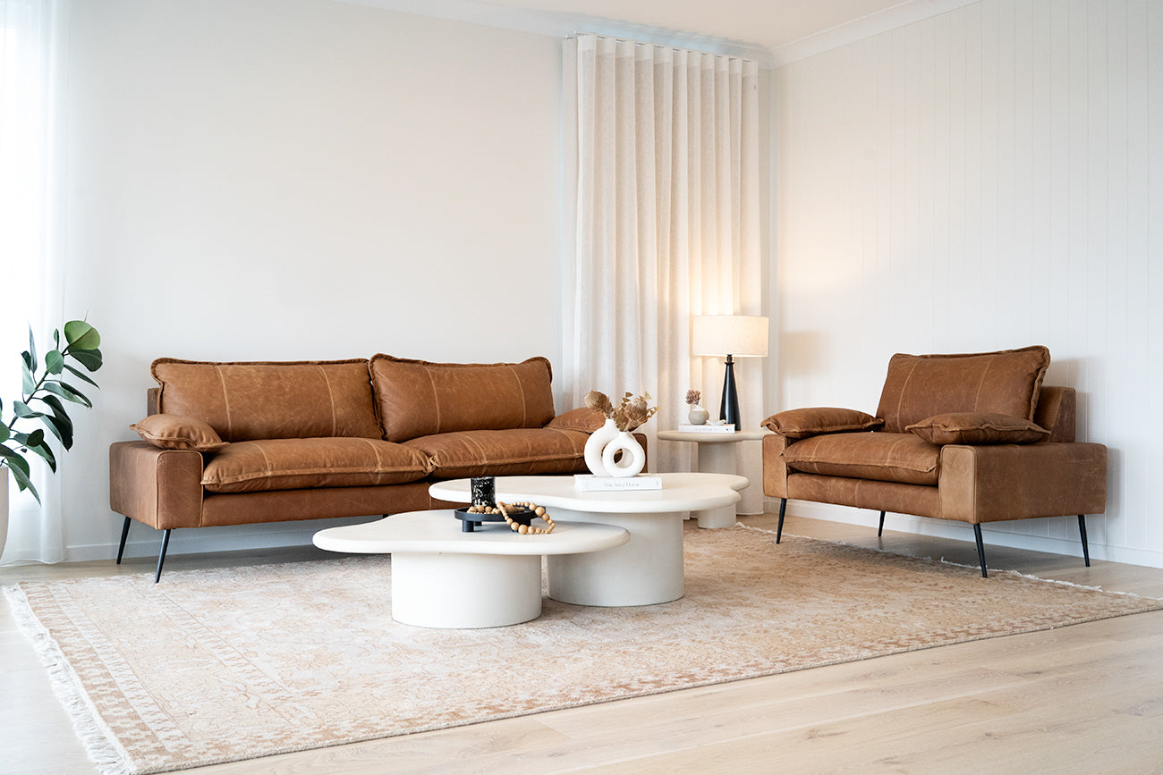Costa Organic Coffee Tables nested together in 100cm and 120cm sizes with ivory microcement finish.