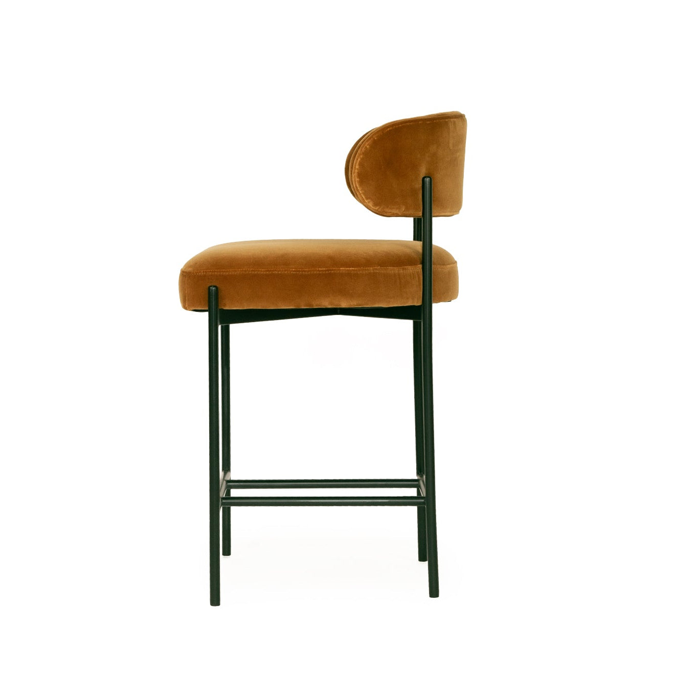 Fontaine Counter Stool with half-moon curved back and metal legs, upholstered in performance velvet in amber, modern Art Deco inspired counter stool for elegant interiors. Side perspective.