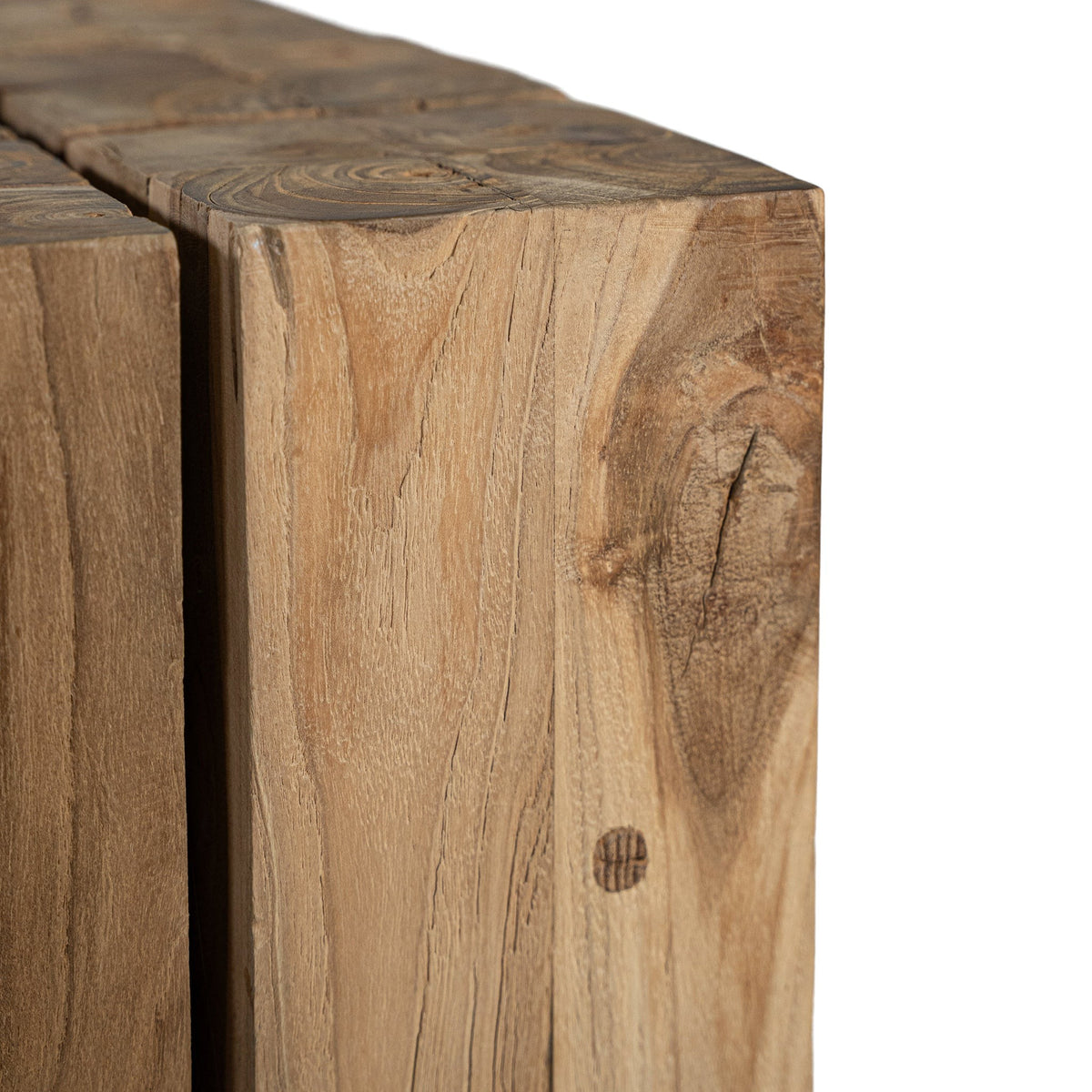 Close-up of the Hamali coffee table corner showing natural teak grain and cracks