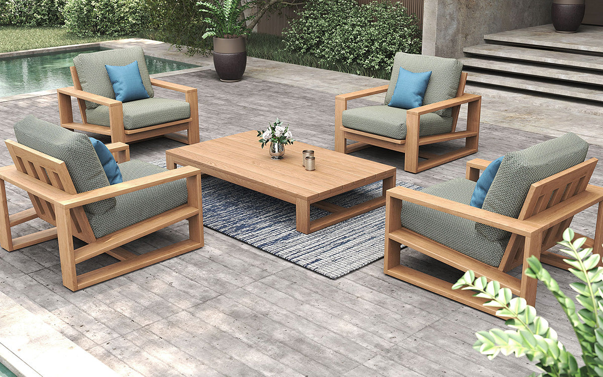 Harbour Island Outdoor Coffee Table – oversize low, made from sustainable premium-grade teak, showcasing a robust, minimalist design ideal for indoor or outdoor use with lasting durability. Styled beautifully in this modern outdoor area.