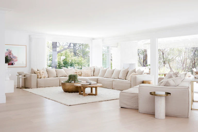 Uniqwa Hendrix Modular Sofa with corner section, with feather cushioning and removable slipcover, timber frame modern coastal sofa with scatter cushions, available in multiple colours. As seen in Three Birds Renovations.
