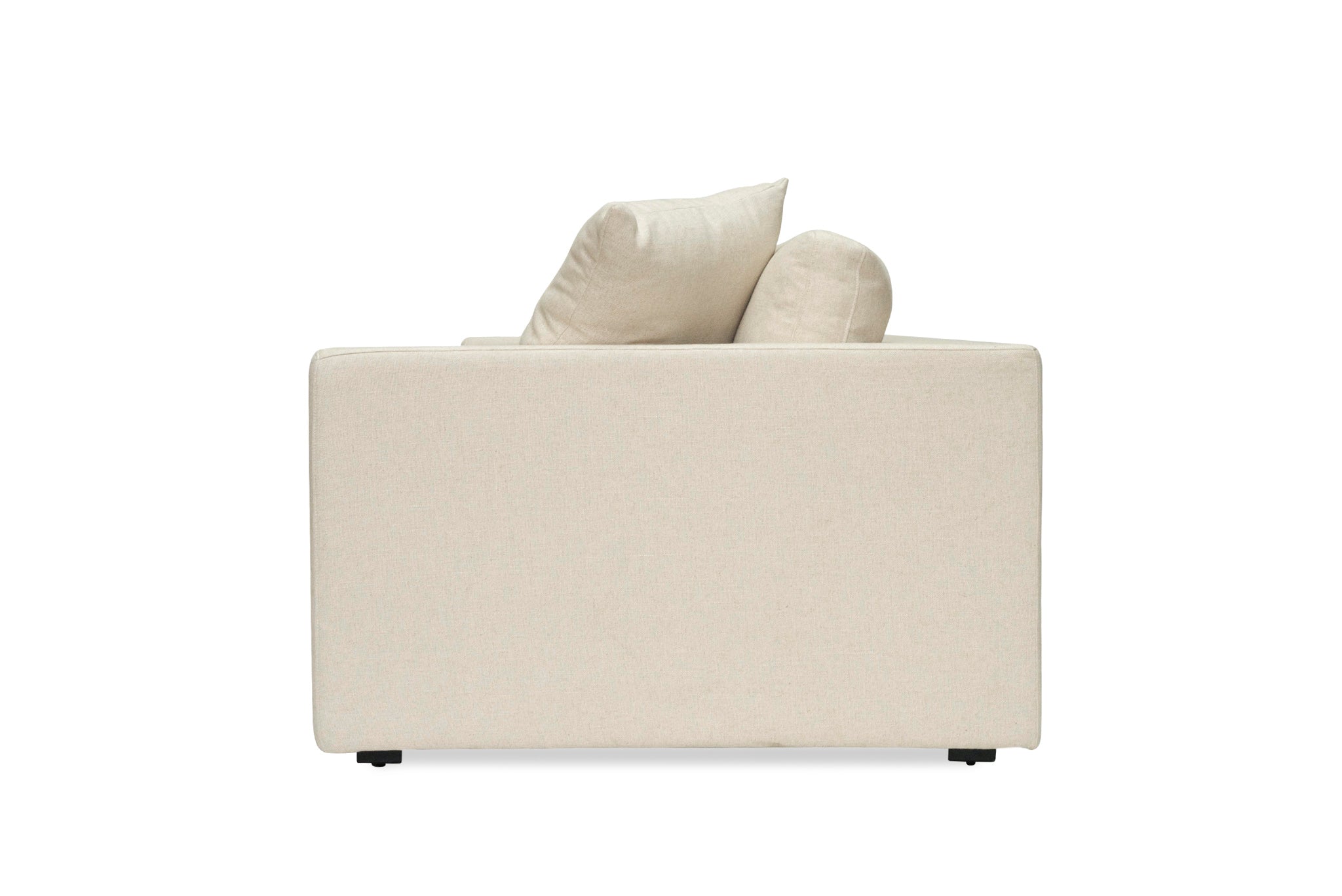 Lucca Four Seater Sofa in performance linen blend upholstery in Dune, refined design, available in boucle oatmeal or saddle leather. Side perspective.