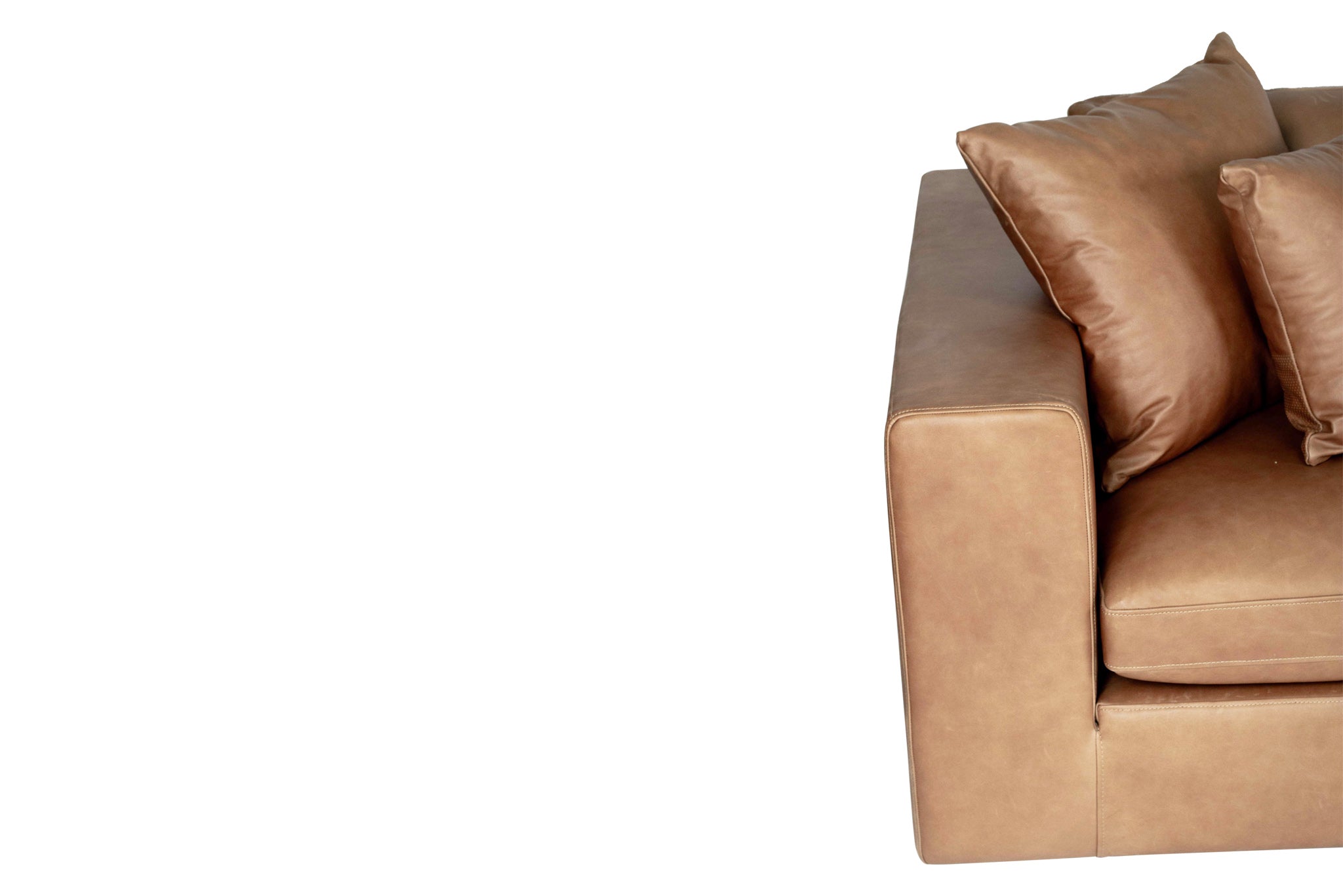 Lucca Four Seater Sofa in trend saddle tan leather with sleek, sophisticated design. Arm rest.