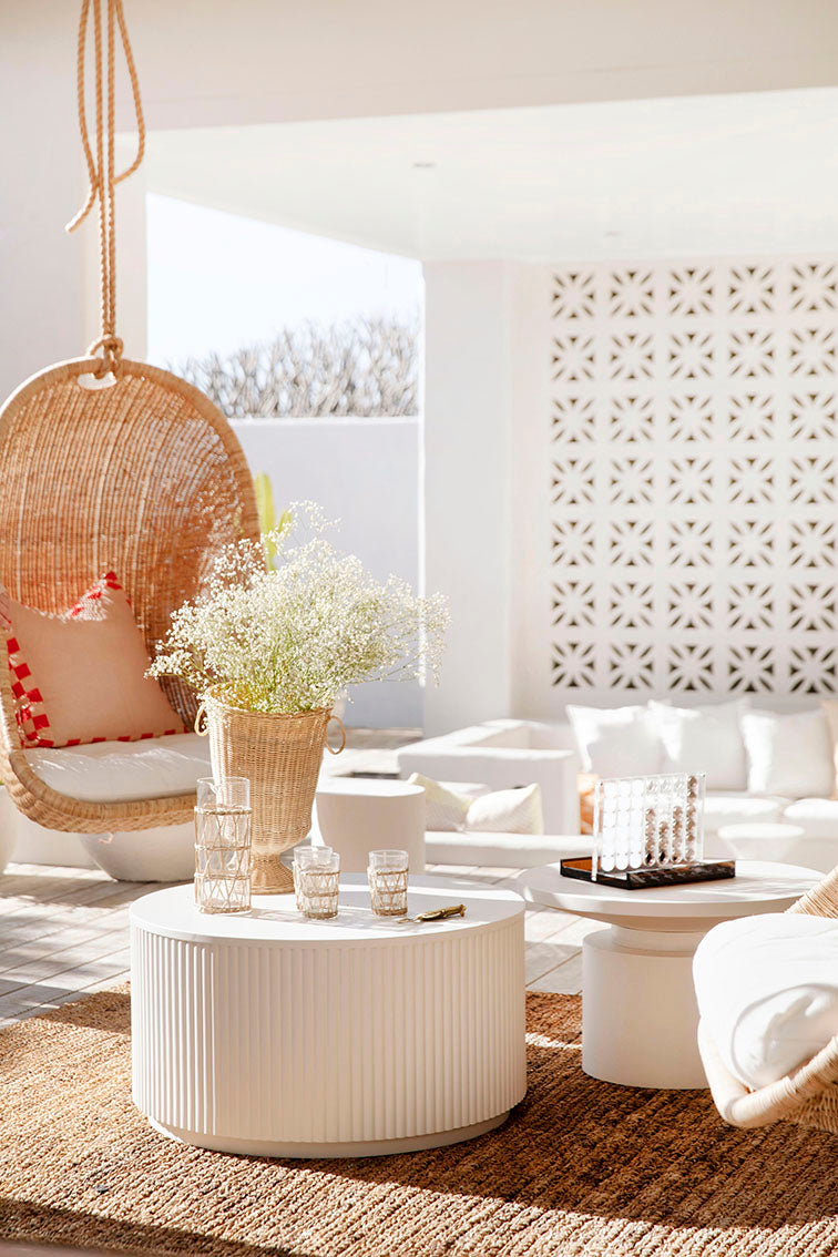 Makenge Rattan Hanging Chair by Uniqwa sold by Magnolia Lane for modern coastal outdoor living