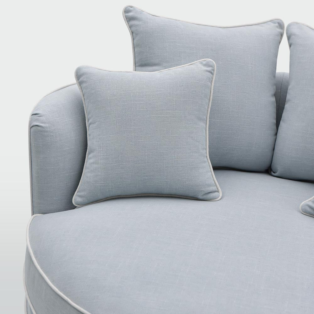 Noosa snuggle occasional chair in Beach with White Piping, cushion detail