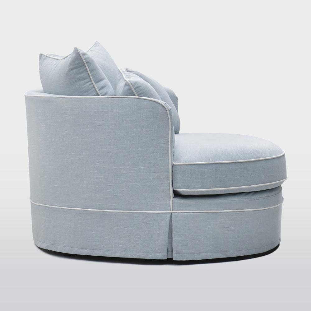 Noosa snuggle occasional chair in Beach with White Piping, side view