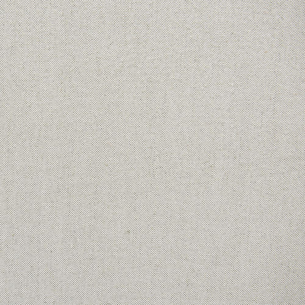 Close-up of the beige upholstery fabric texture on the Noosa snuggle chair