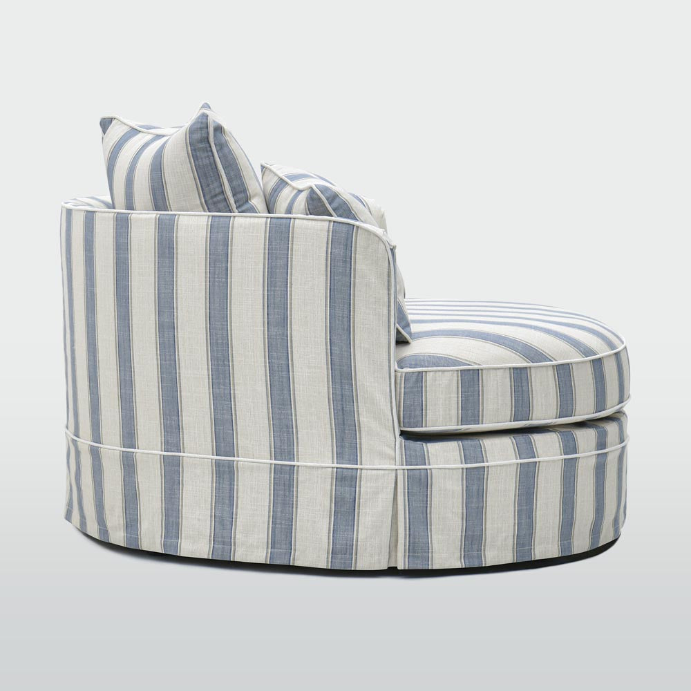 Noosa snuggle occasional chair in Blue Sky Stripe, side view