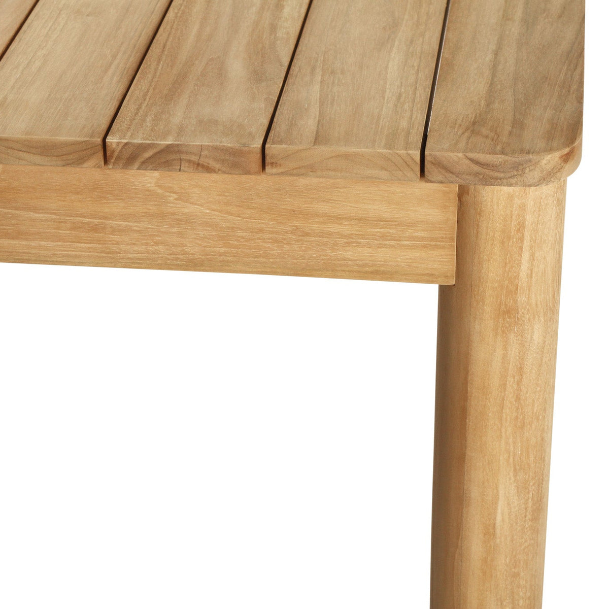 Noosa outdoor dining table showing natural teak grain and slatted tabletop detail - top view