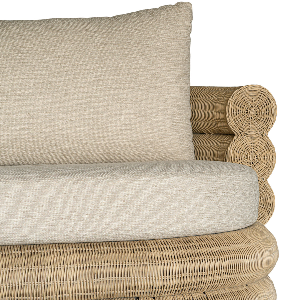 Satori outdoor three seater sofa, close-up of the seat cushion and rounded woven arm