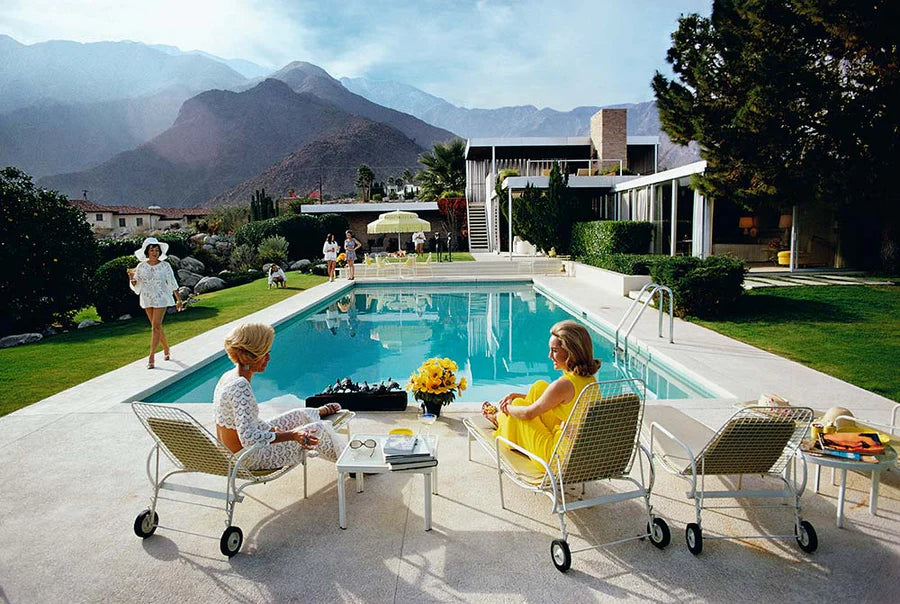 Slim Aarons Poolside Gossip photographic print, iconic Palm Springs 1970 image featuring Lita Baron, Nelda Linsk, and Helen Dzo Dzo, premium artwork.