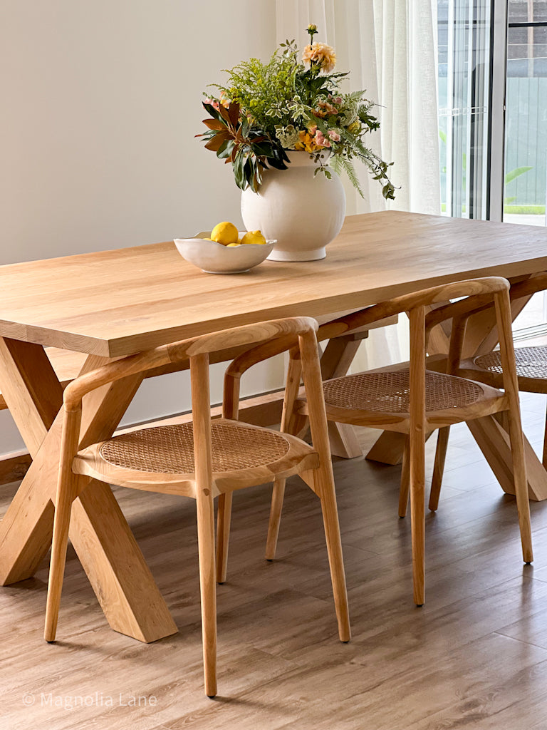 Surfer Dining Table made from premium A-Grade American Oak with a natural raw finish, perfect for elegant Sunday meals with family. Styled in this beautiful coastal home.
