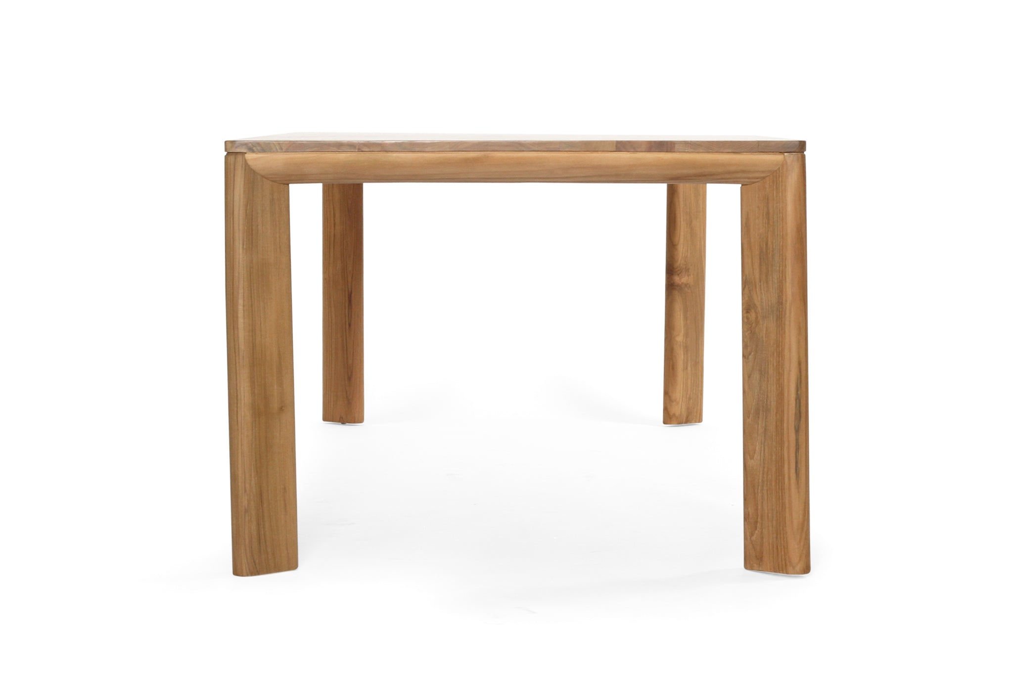 Great Teak Dining Table in A-grade teak with a natural brushed finish, offering exceptional durability and timeless elegance—also available in American Oak. Side end view