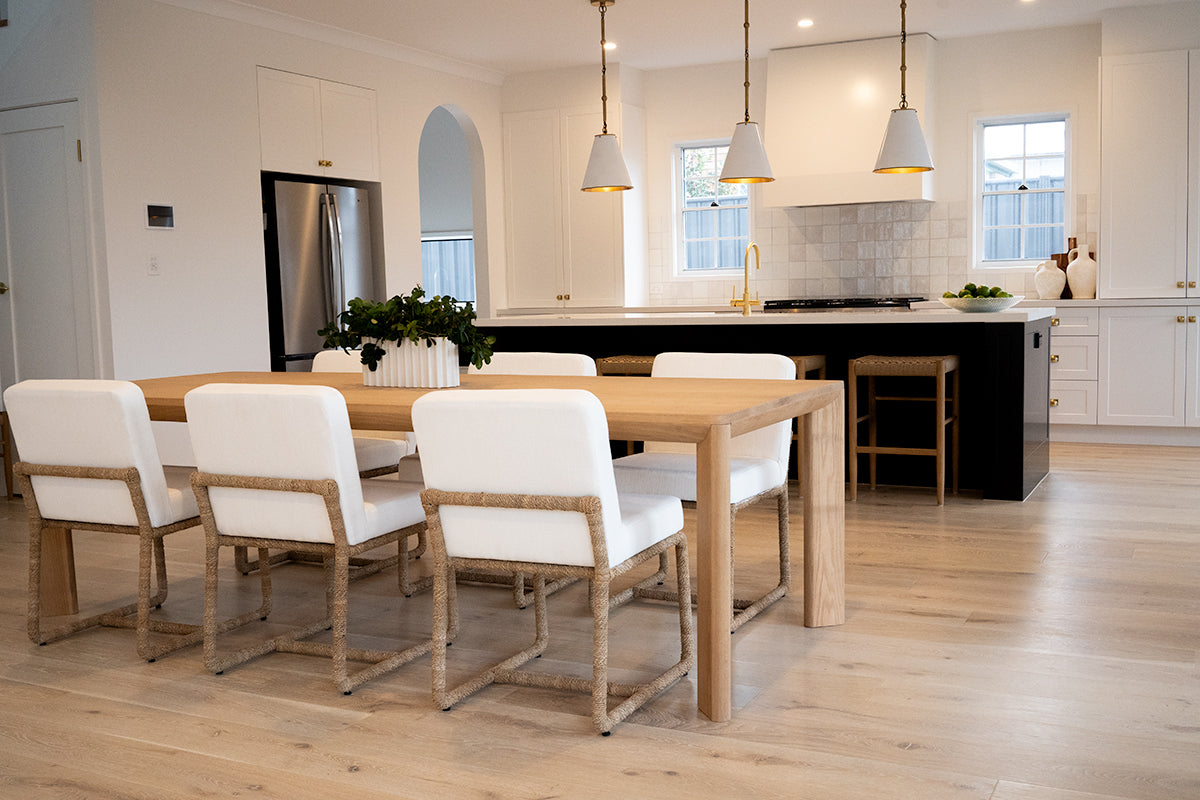 Great Dining Table made from solid American Oak with a raw Osmo PolyX finish, designed as a durable and elegant dining centerpiece. Styled in this beauttiful modern home 1