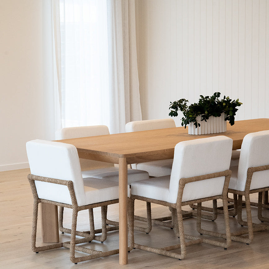 Great Dining Table made from solid American Oak with a raw Osmo PolyX finish, designed as a durable and elegant dining centerpiece. Styled in this beauttiful modern home.