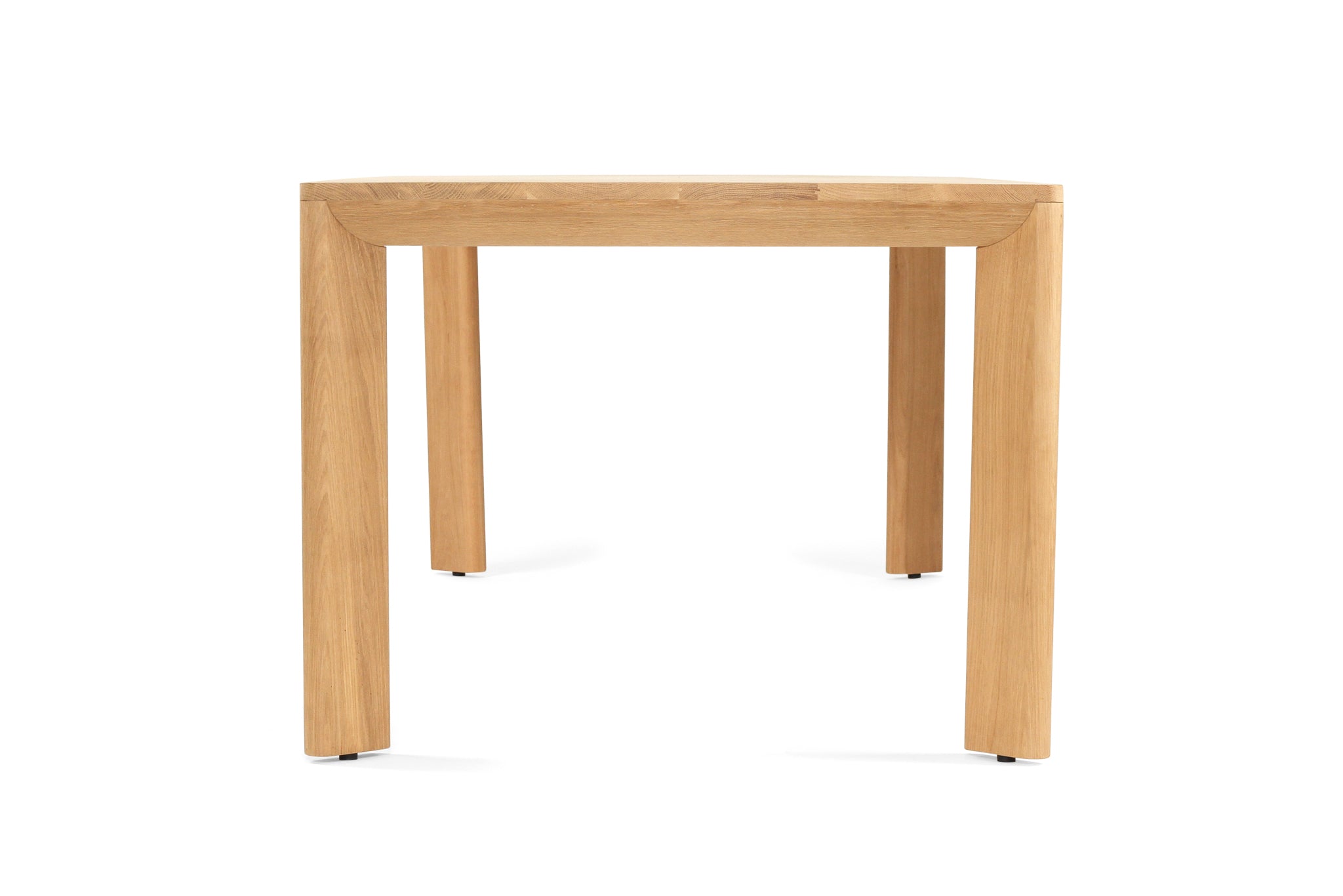 Great Dining Table made from solid American Oak with a raw Osmo PolyX finish, designed as a durable and elegant dining centerpiece. Side angle view