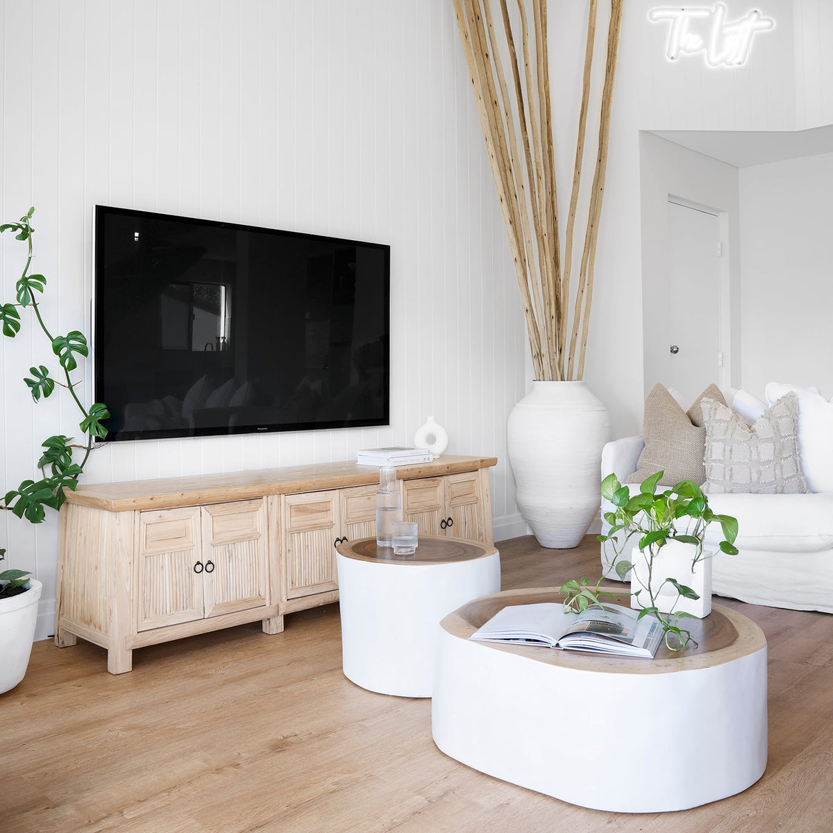 White Trunk Coffee Table styled with a timber entertainment unit and white sofa