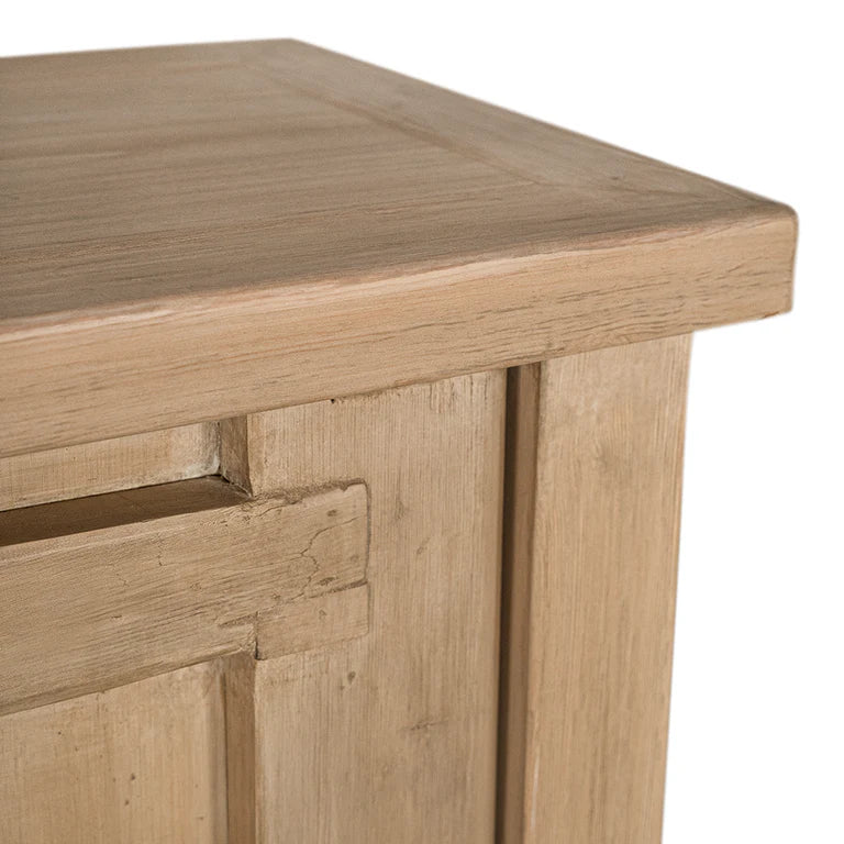 Bulu Bedside Table with right-hand door, handcrafted from reclaimed timber with natural weathered texture and carved details, coastal organic furniture with timeless character. Close up 3.