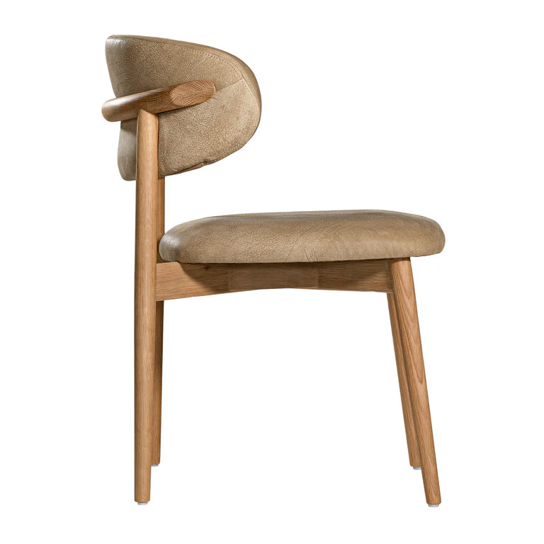 Capri Dining Chair in Enoki by Uniqwa – luxury modern style with buffalo leather upholstery and white oak frame, ideal for refined residential or commercial interiors. Side perspective