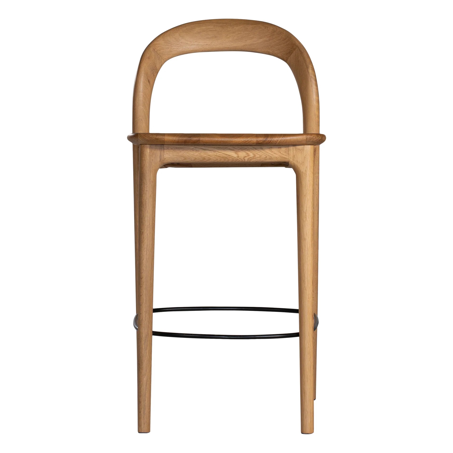 Loki Bar Chair in solid oak with natural finish, featuring sculptural minimalist design, rich wood grain, and black iron footrest for a modern touch. Front perspective.