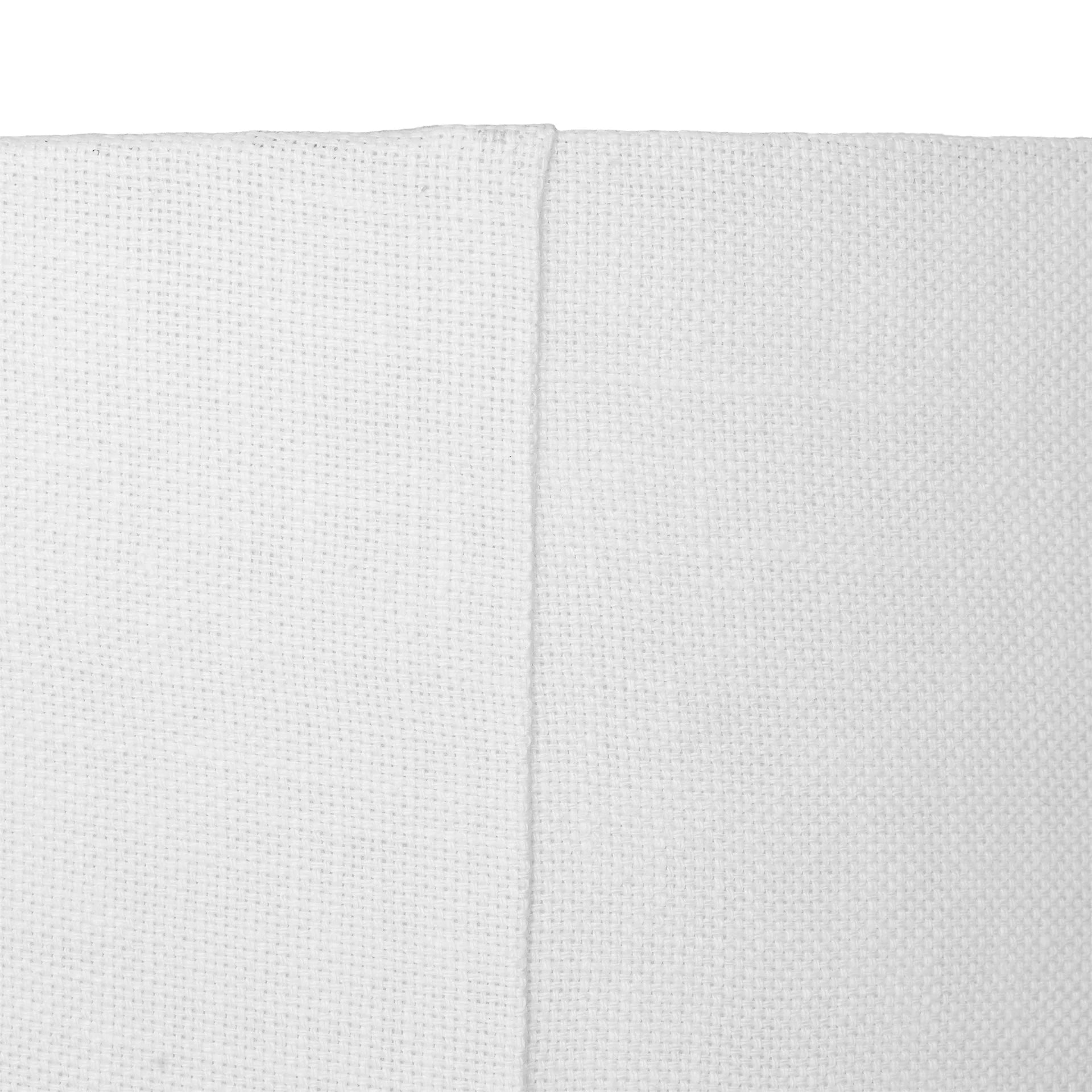 Rundu Table Lamp handcrafted from solid munggur wood with hand-carved textured grooves, showcasing natural wood variations and a soft ambient glow. Close up shade.