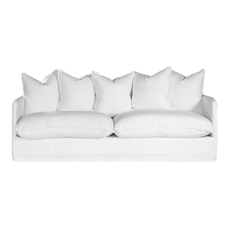 Singita Three Seater Sofa with hardwood frame, feather-filled cushions and removable slipcovers in luxury linen in white. Front perspective.