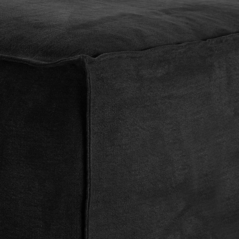 Hendrix Bedhead in black with feather cushioning and removable linen slipcover, timber frame upholstered bedhead for modern coastal bedroom style.