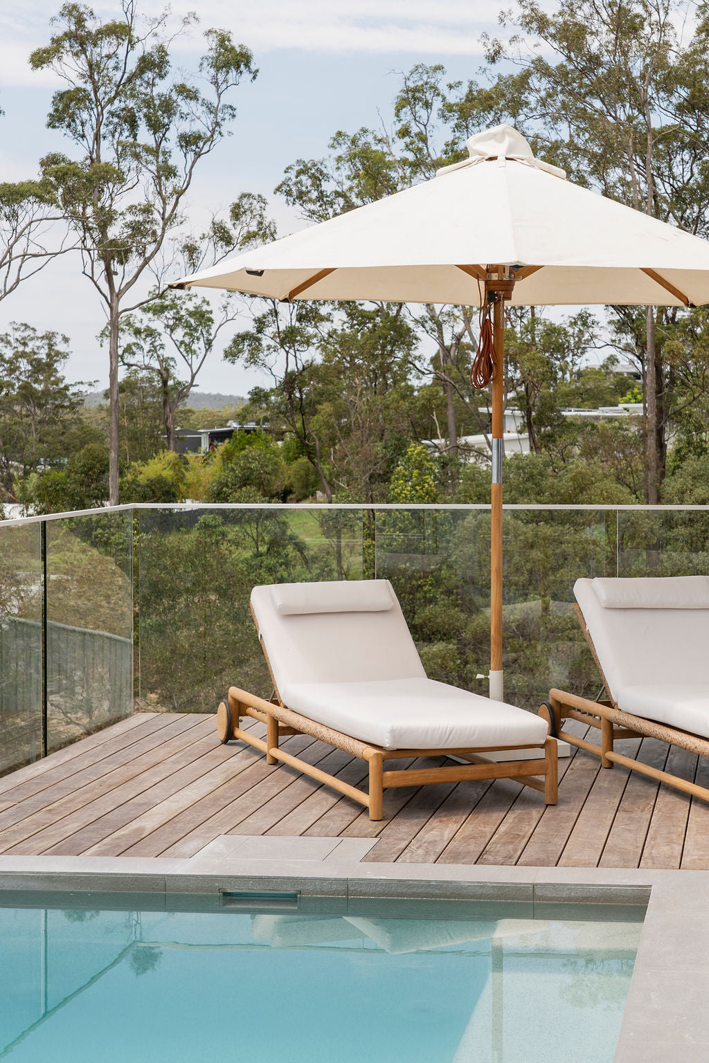 Vaucluse Outdoor Sunlounger in Grade A teak with white Sunbrella cushion, adjustable backrest and wheels, durable coastal outdoor furniture for poolside or garden relaxation. Magnolia Lane coastal style living.