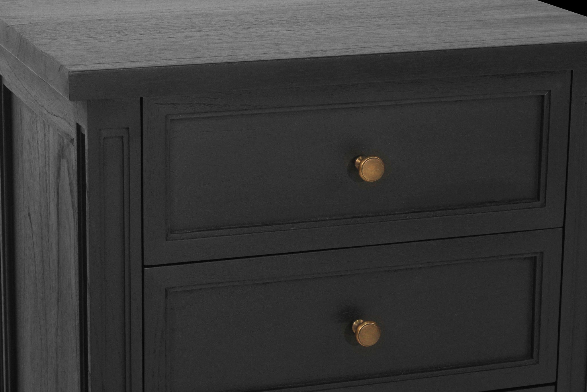 Whitsunday 3 Drawer Bedside Table in black with fluted legs and natural cane shelf, solid hardwood coastal bedroom furniture. Drawer close up.