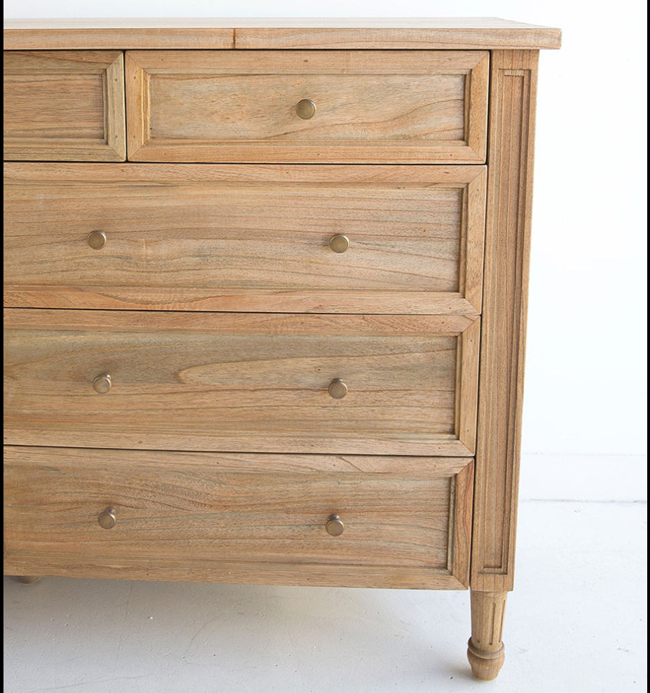 Close-up of white cedar dresser showing drawer detail, weathered oak finish and knobs.