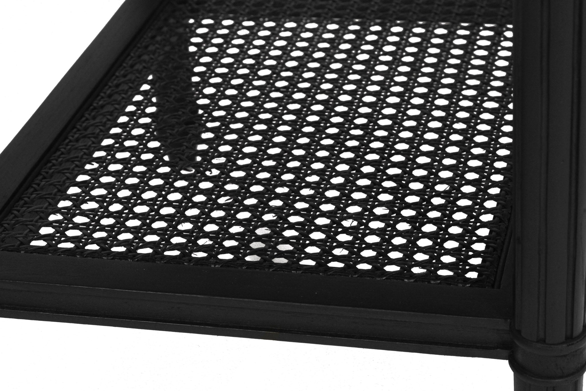 Whitsunday Bedside Table in black with fluted legs and natural cane shelf, solid hardwood coastal bedroom furniture. Shelf detail.