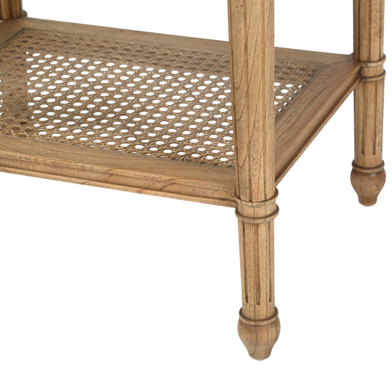 Weathered oak bedside table with fluted legs and open cane shelf storage