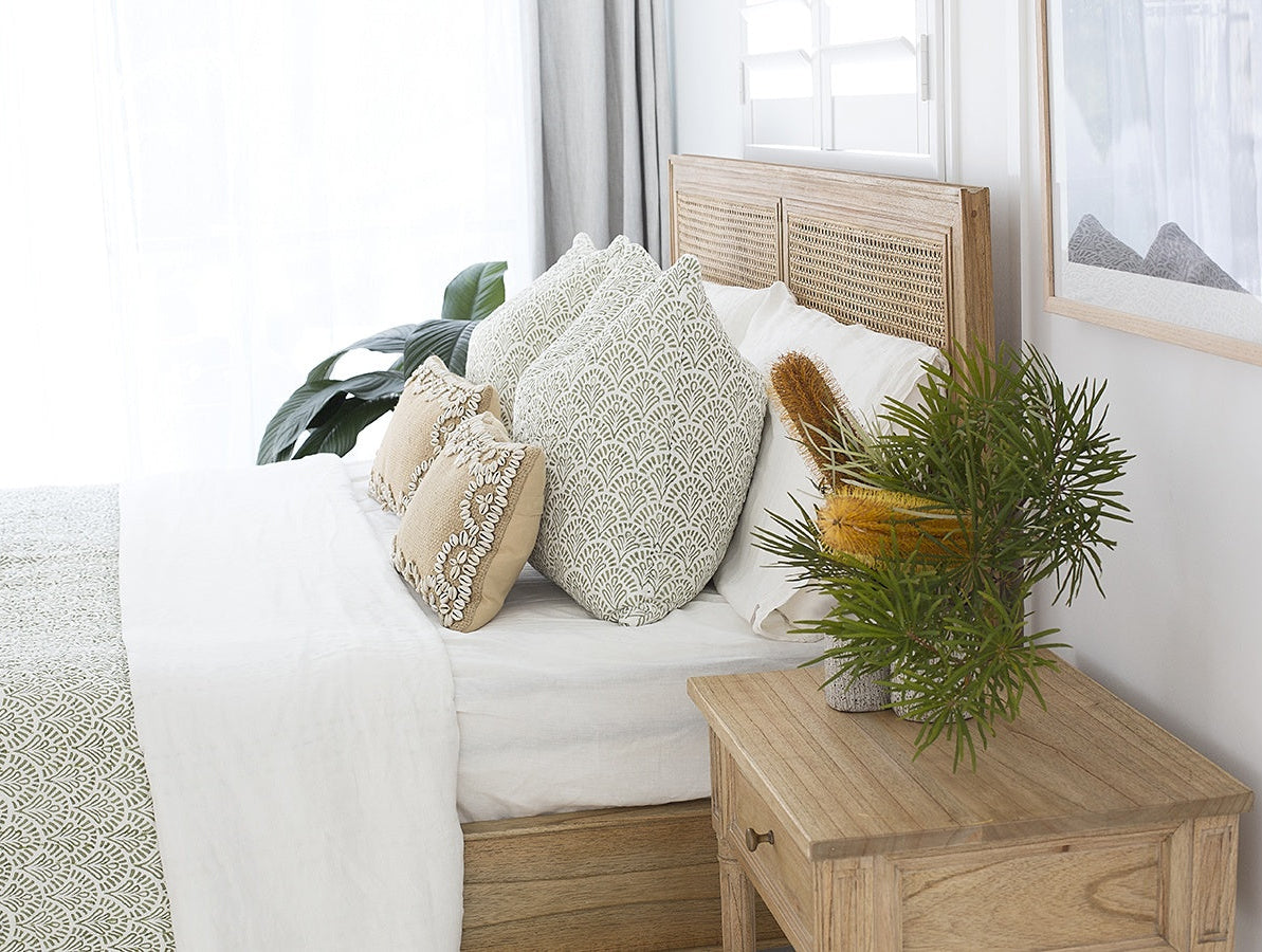Whitsunday Cane Bed styled in a relaxed coastal bedroom interior