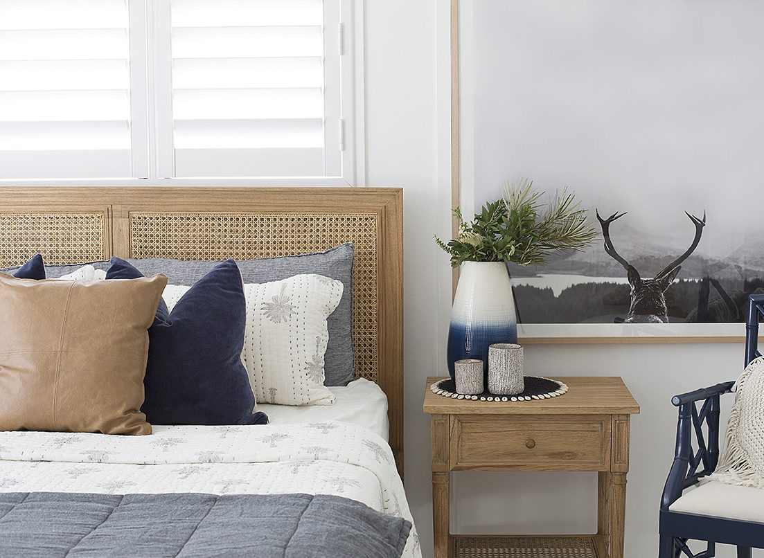 Whitsunday Cane Bedhead with handwoven rattan and weathered wash finish, coastal bedroom furniture with natural charm. Coastal interior.