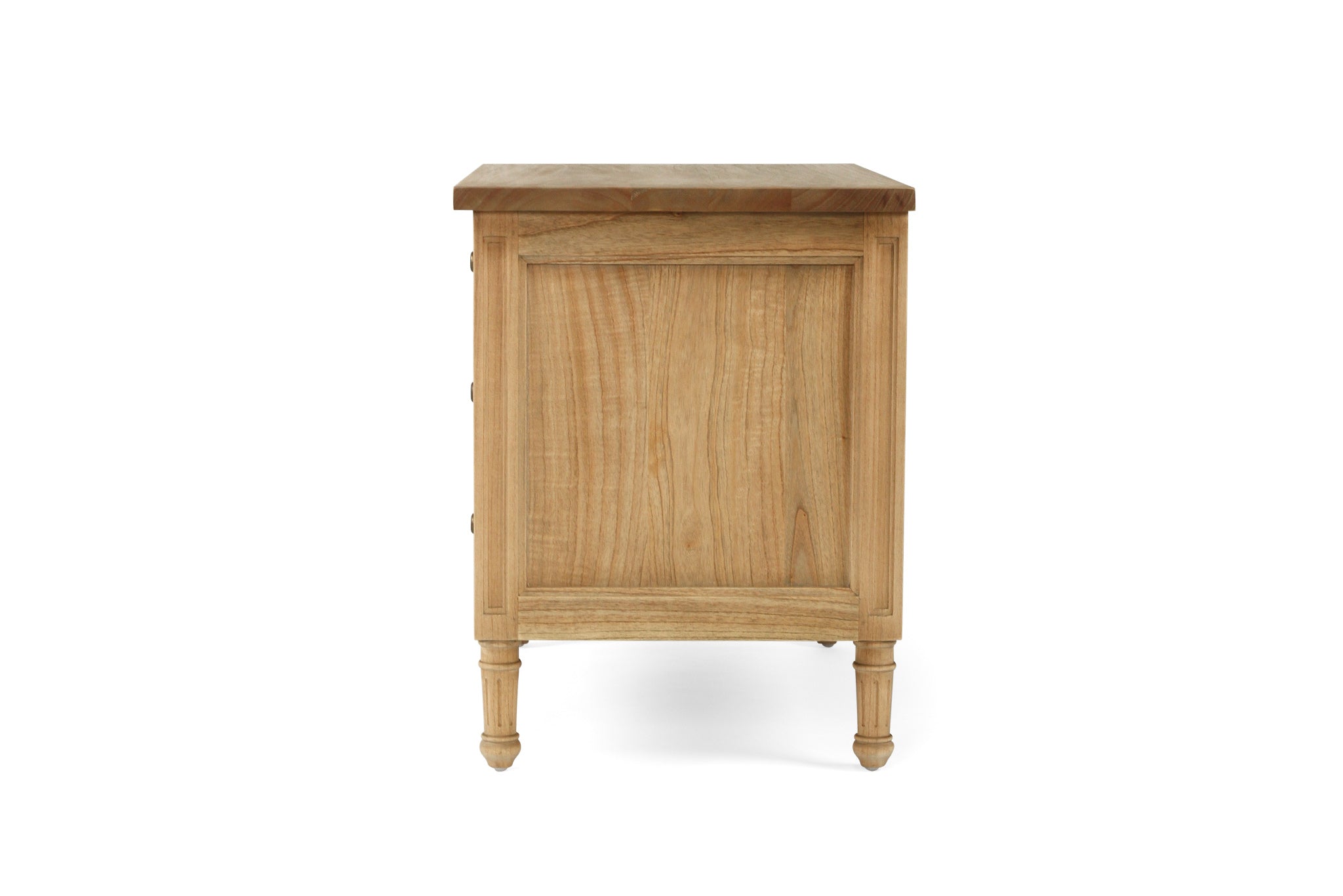Whitsunday 3 Drawer Wide Nightstand in weathered oak, solid hardwood bedside table with three drawers, coastal bedroom furniture with timeless beachside charm. Side perspective.
