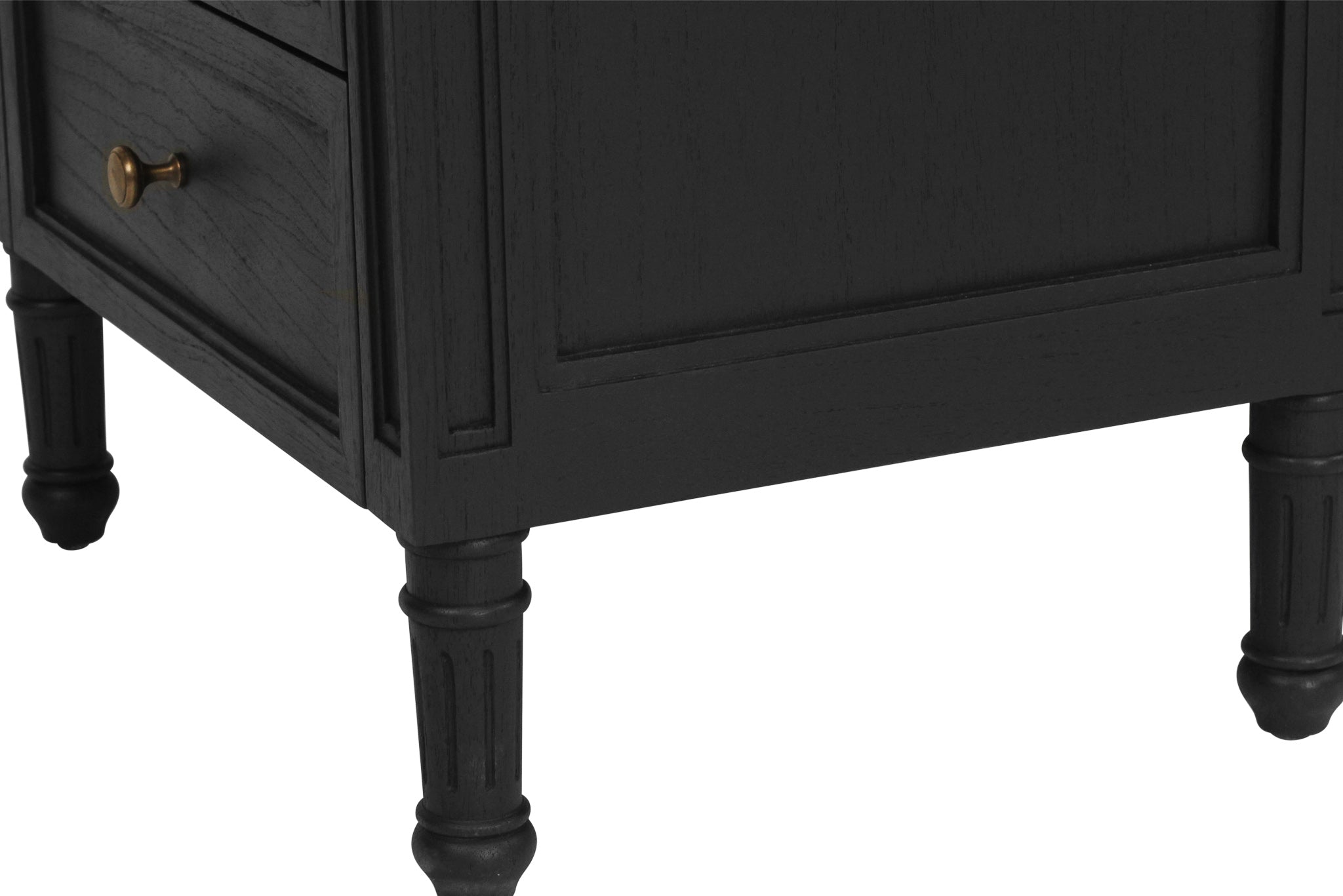Whitsunday 3 Drawer Bedside Table in black with fluted legs and natural cane shelf, solid hardwood coastal bedroom furniture. Leg detail.