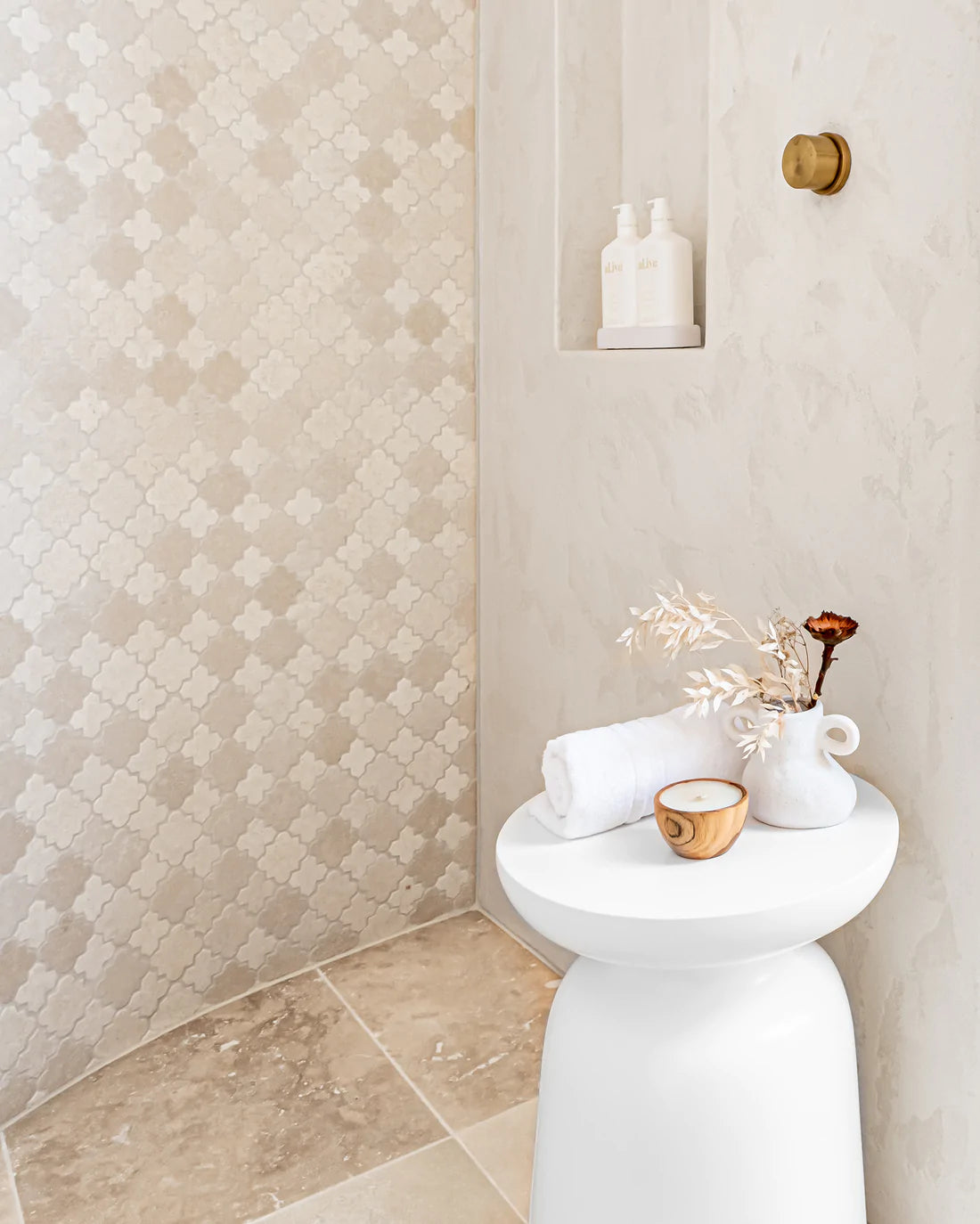 Akoni Side Table in white resin by Uniqwa Collections, mid-century inspired design, lightweight and durable, perfect for modern indoor or outdoor spaces. Magnolia Lane coastal luxe bathroom style 1.