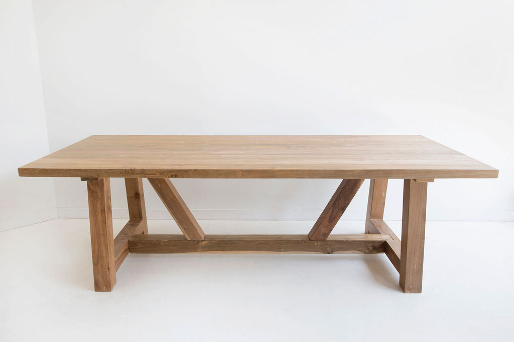 Gather Indoor Dining Table in Reclaimed Teak, front view.