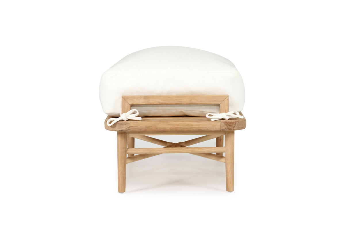 Harbour Island Indoor Armchair + Ottoman, front angle view.