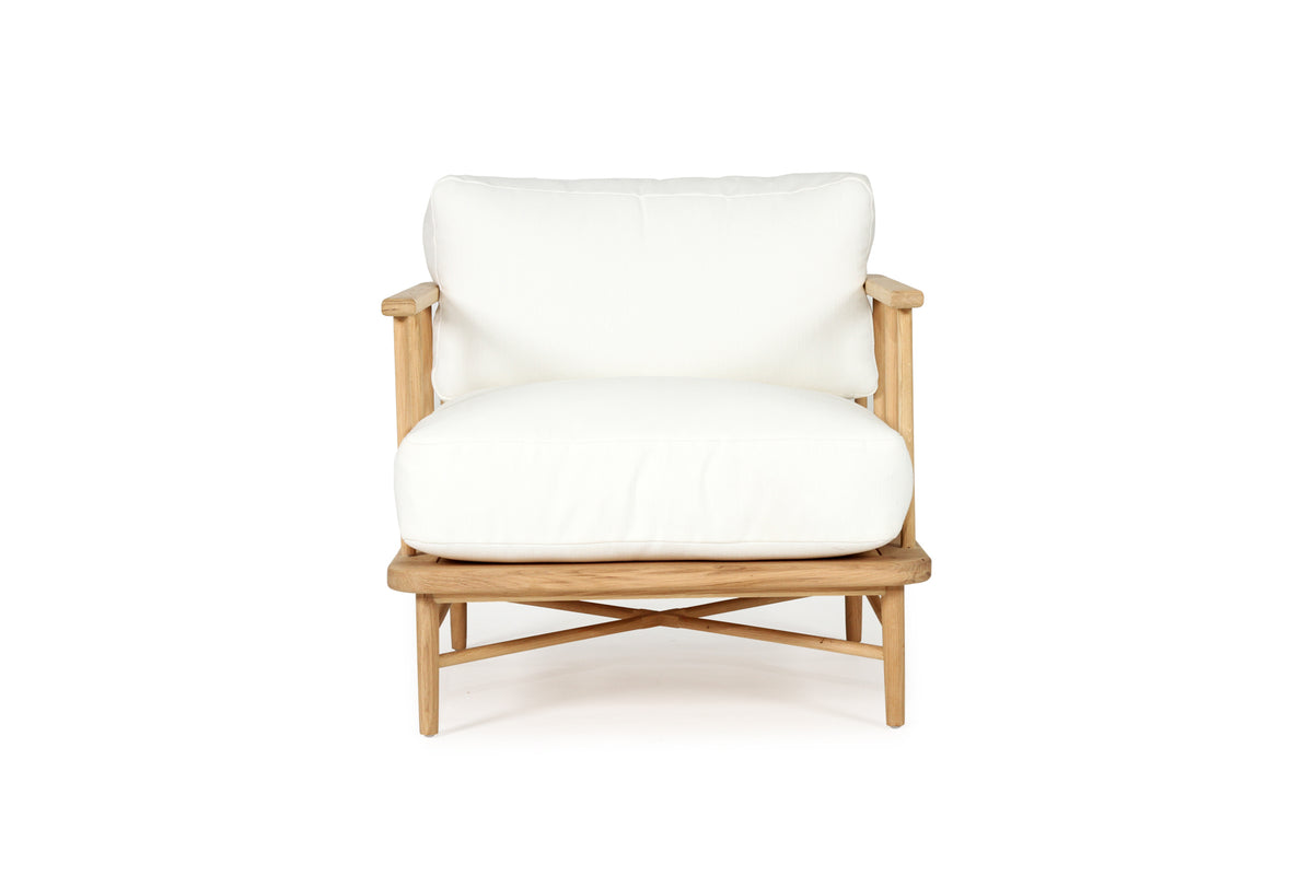 Harbour Island Indoor Armchair + Ottoman, front view.