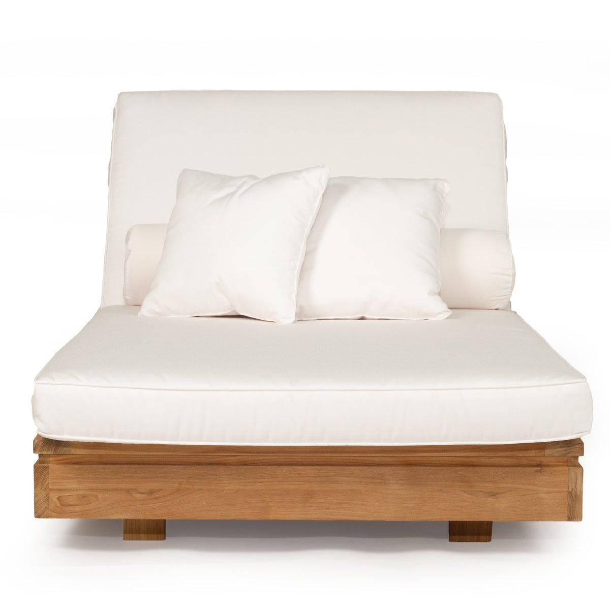 Front view of the Harbour Island sun lounger with raised backrest, light cushions and teak base