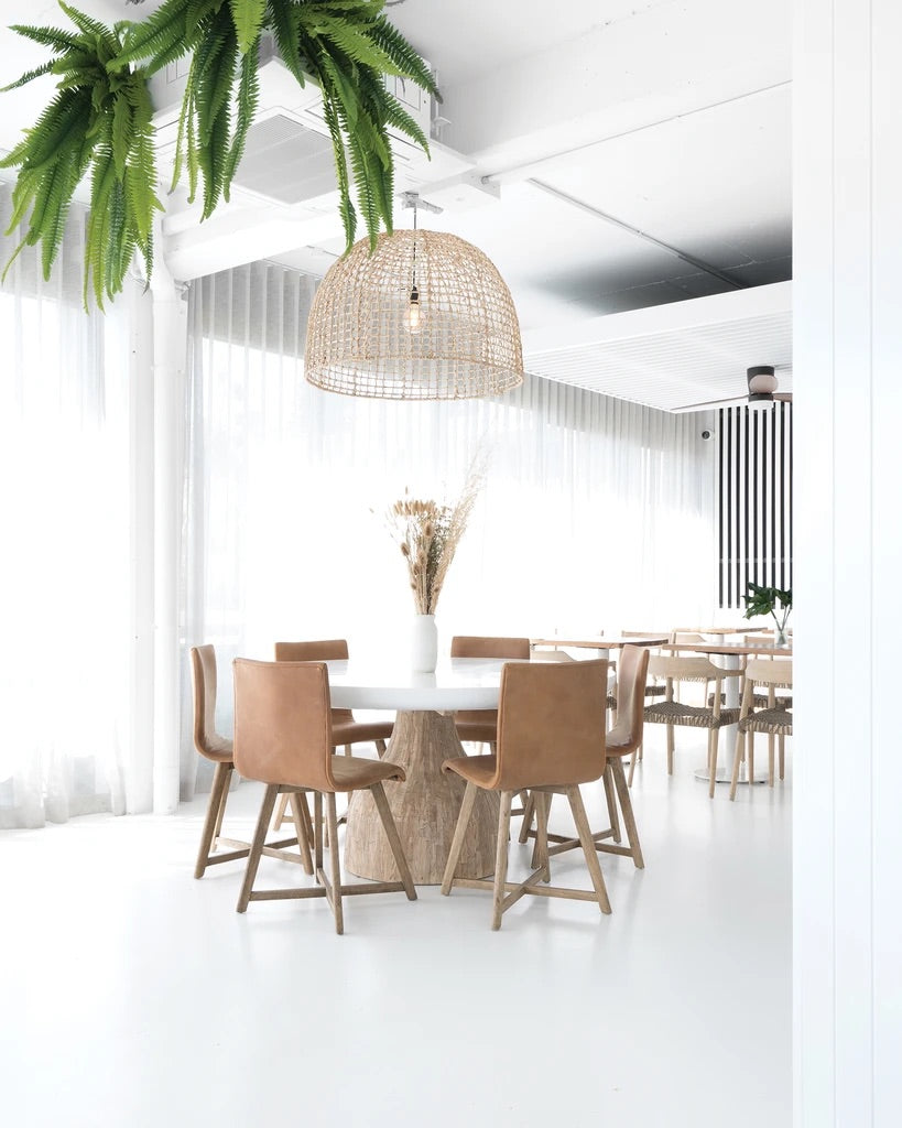 Lolesa Pendant Light by Uniqwa styled over a dining table in a Villa style interior, sold by Magnolia Lane