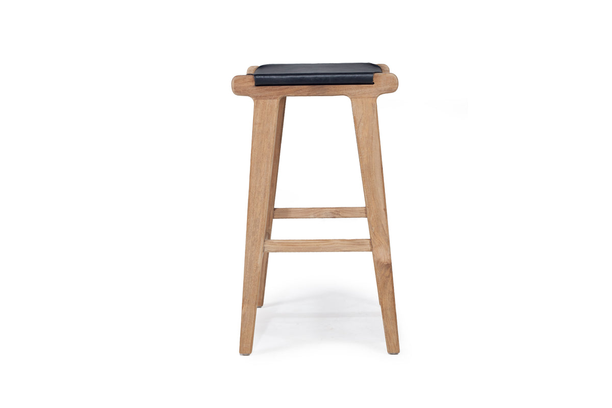 Leather Saddle Stool - Flat in Black, side view.
