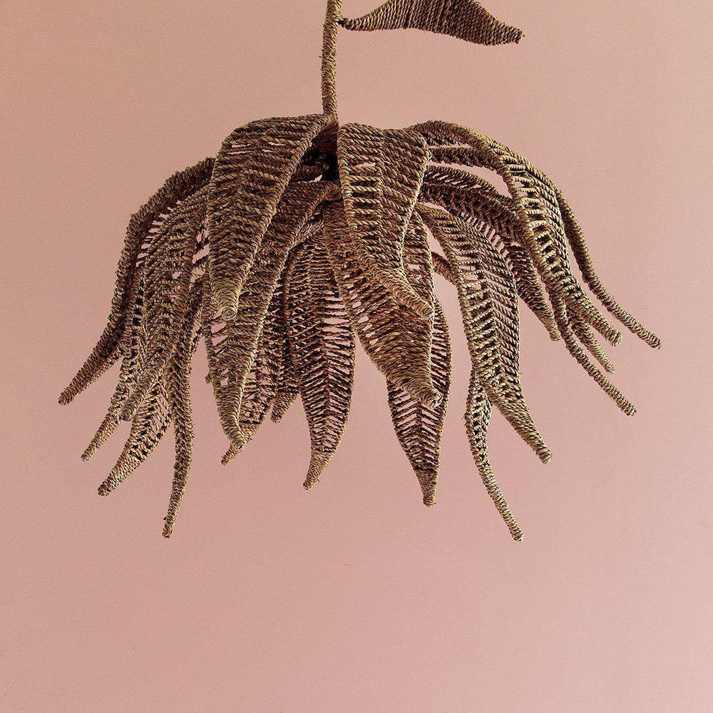 Lotus Chandelier handwoven with seagrass rope over a wrought iron frame, featuring a unique lotus design for a bohemian statement piece. Magnolia Lane 5